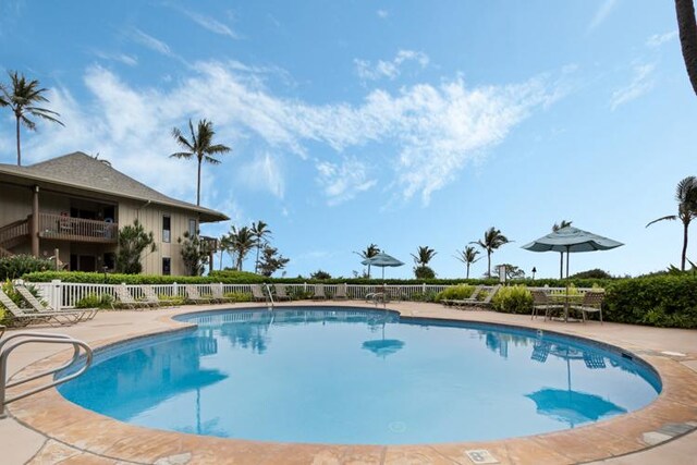 4460 Nehe Rd Unit 118, Lihue, HI 96766 - community pool featuring a patio