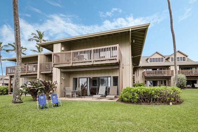 4460 Nehe Rd Unit 118, Lihue, HI 96766 - back of house with a balcony, a yard, and a patio