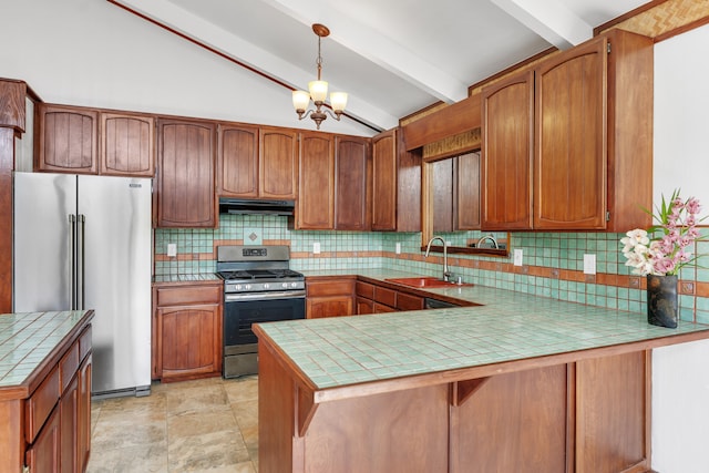 64-5270 Hoohoa St, Kamuela, HI 96743 - kitchen with stainless steel appliances, a sink, under cabinet range hood, tile countertops, and backsplash