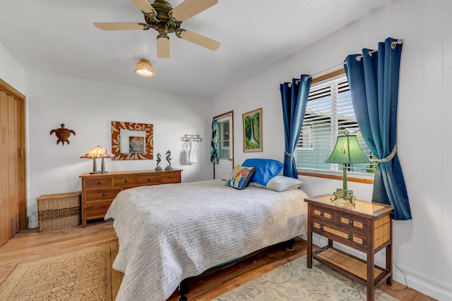 64-5270 Hoohoa St, Kamuela, HI 96743 - bedroom with light wood finished floors and ceiling fan