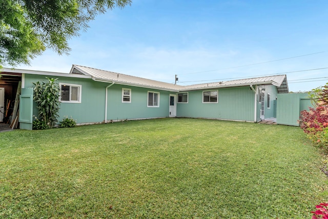 64-5270 Hoohoa St, Kamuela, HI 96743 - back of property with metal roof and a lawn