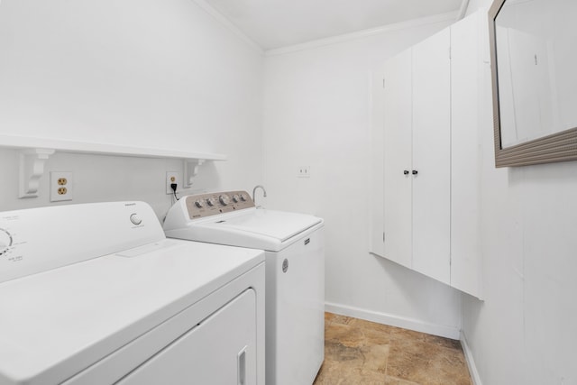64-5270 Hoohoa St, Kamuela, HI 96743 - laundry area with baseboards, washer and dryer, crown molding, light stone finish floors, and cabinet space