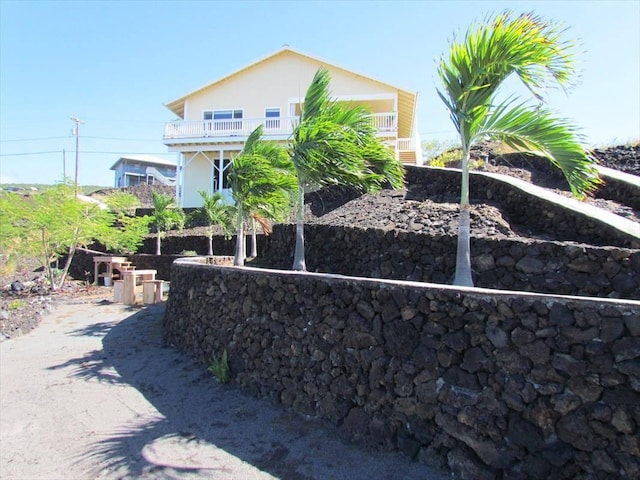 88-1978 Milolii Rd, Captain Cook, HI 96704 - view of property exterior with a balcony