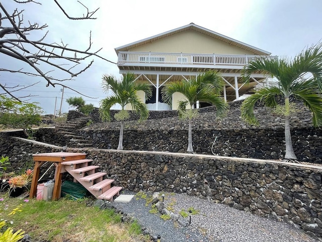 88-1978 Milolii Rd, Captain Cook, HI 96704 - view of property exterior featuring stairway and a balcony