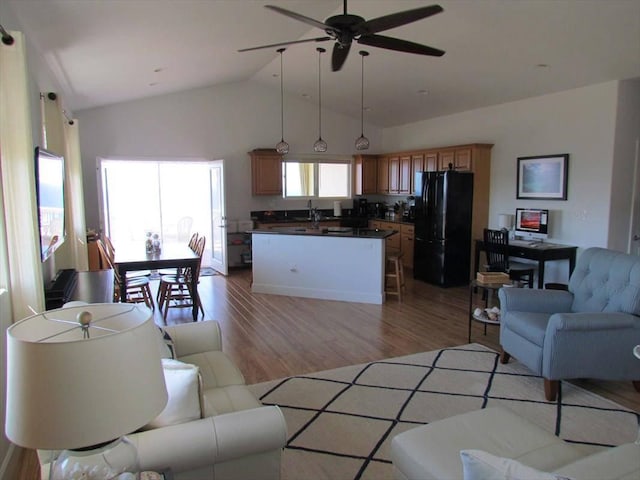 88-1978 Milolii Rd, Captain Cook, HI 96704 - living room with light wood-style floors, high vaulted ceiling, and ceiling fan