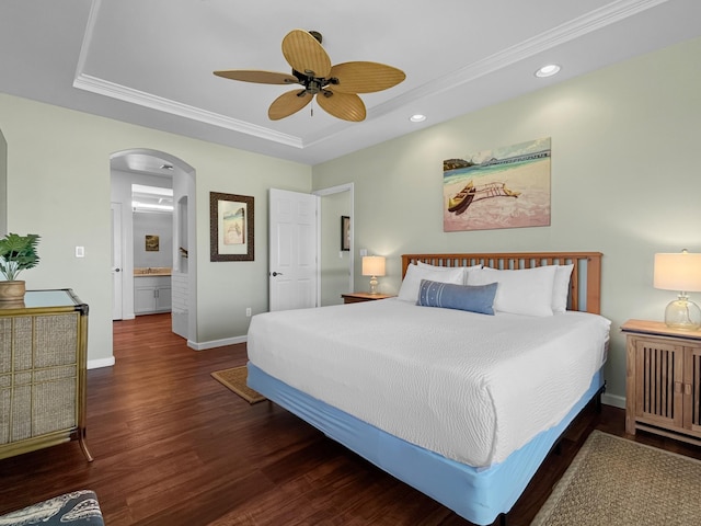 68-1125 Kaniku Dr Unit 1601, Kamuela, HI 96743 - bedroom featuring a raised ceiling, arched walkways, wood finished floors, baseboards, and recessed lighting