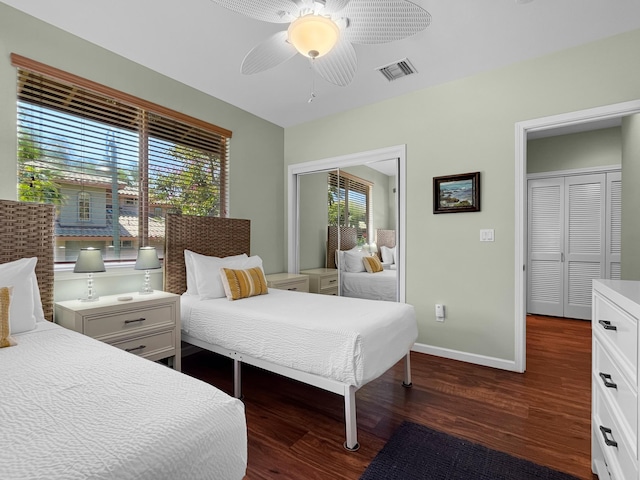 68-1125 Kaniku Dr Unit 1601, Kamuela, HI 96743 - bedroom featuring dark wood-style floors, baseboards, and ceiling fan