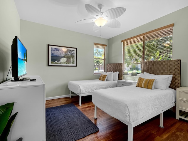 68-1125 Kaniku Dr Unit 1601, Kamuela, HI 96743 - bedroom featuring wood finished floors, ceiling fan, and baseboards