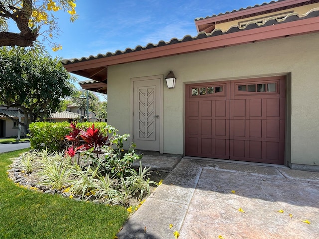 68-1125 Kaniku Dr Unit 1601, Kamuela, HI 96743 - garage featuring concrete driveway