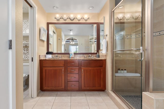 68-1122 Na Ala Hele Rd Unit H22, Kamuela, HI 96743 - bathroom with toilet, double vanity, a shower stall, tile patterned floors, and ceiling fan