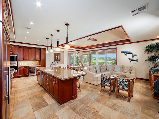 62-3600 Amaui Pl Unit 345, Waimea, HI 96743 - kitchen with beverage cooler, built in appliances, crown molding, open floor plan, and a sink