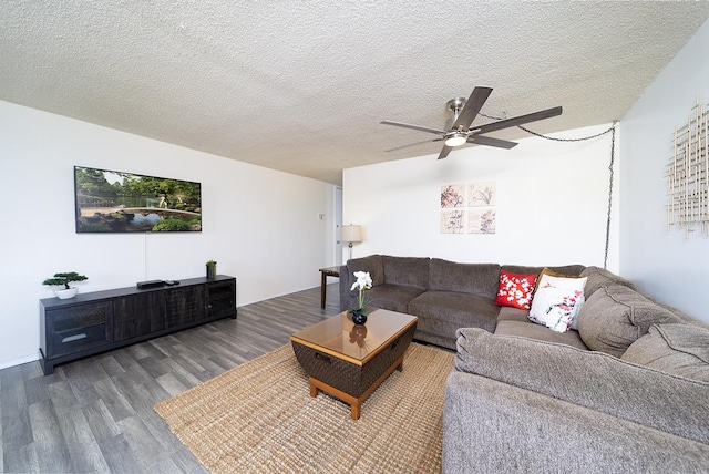 84 Pukihae St Unit 1106, Hilo, HI 96720 - living room with wood finished floors, ceiling fan, and a textured ceiling