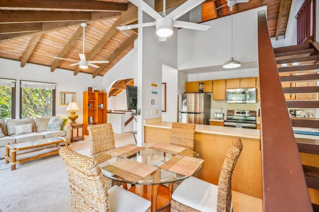 1901 Poipu Rd Unit 821, Koloa, HI 96756 - dining space featuring ceiling fan, wooden ceiling with exposed beams, high vaulted ceiling, and stairway