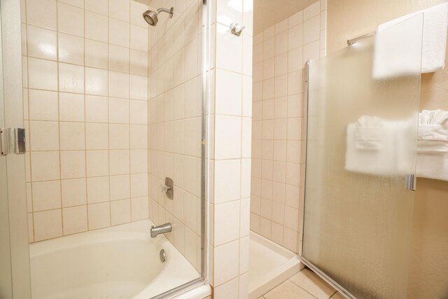 1901 Poipu Rd Unit 821, Koloa, HI 96756 - full bathroom with bath / shower combo with glass door and tile patterned flooring