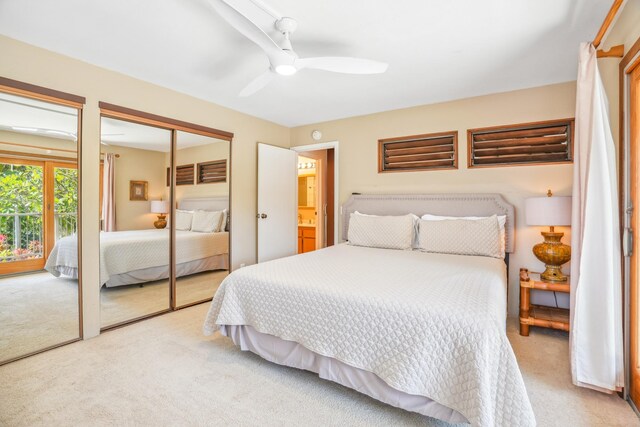 1901 Poipu Rd Unit 821, Koloa, HI 96756 - carpeted bedroom featuring multiple closets and a ceiling fan