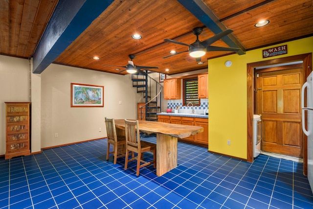 7315 Alealea Rd, Hanalei, HI 96714 - kitchen with wooden ceiling with exposed beams, a ceiling fan, light countertops, recessed lighting, and dark tile patterned flooring