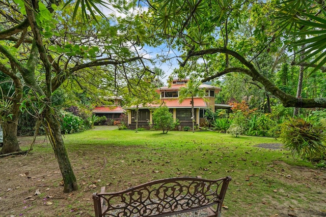 7315 Alealea Rd, Hanalei, HI 96714 - view of green lawn with a sunroom