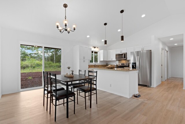 16-2072 Hapuu Dr, Pahoa, HI 96778 - dining room featuring a chandelier, light wood-style flooring, recessed lighting, and high vaulted ceiling