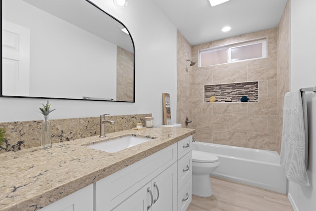 16-2072 Hapuu Dr, Pahoa, HI 96778 - full bathroom featuring toilet, vanity, wood finished floors, shower / bathtub combination, and recessed lighting