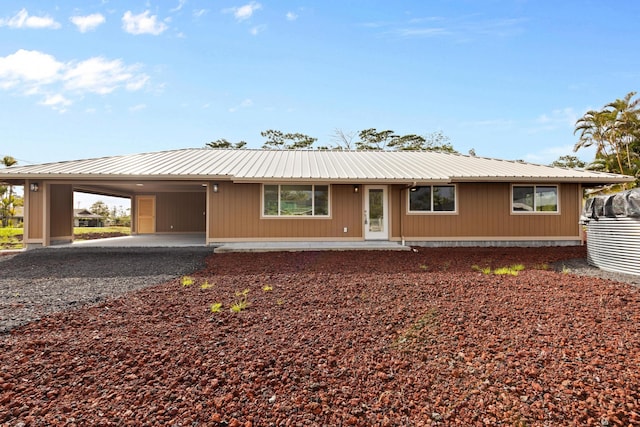 16-2072 Hapuu Dr, Pahoa, HI 96778 - view of front of house with metal roof, a carport, and driveway