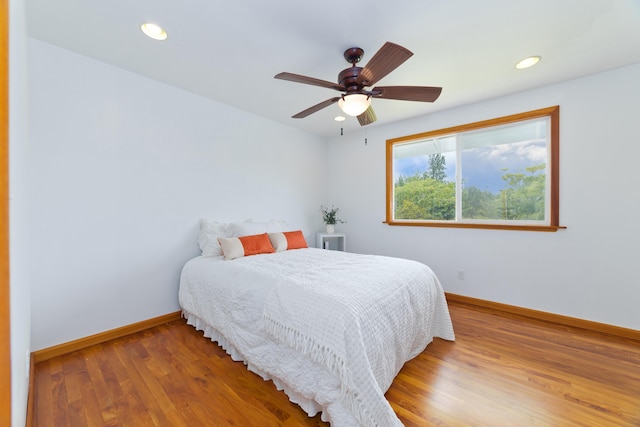 15-1505 2nd Ave, Keaau, HI 96749 - bedroom featuring baseboards, wood finished floors, recessed lighting, and ceiling fan