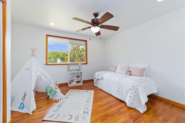 15-1505 2nd Ave, Keaau, HI 96749 - bedroom with baseboards, wood finished floors, and recessed lighting