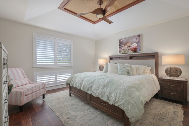 68-1122 Na Ala Hele Rd Unit A22, Kamuela, HI 96743 - bedroom featuring dark wood-type flooring, a ceiling fan, and a raised ceiling