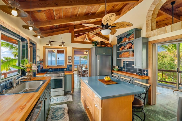 87-287 Kaohe Rd, Captain Cook, HI 96704 - kitchen with wooden ceiling, stainless steel appliances, a sink, butcher block countertops, and open shelves