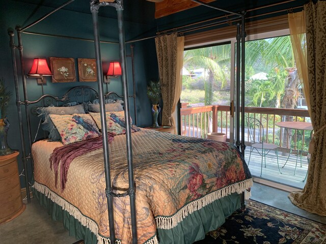 87-287 Kaohe Rd, Captain Cook, HI 96704 - bedroom with multiple windows, access to outside, and carpet floors