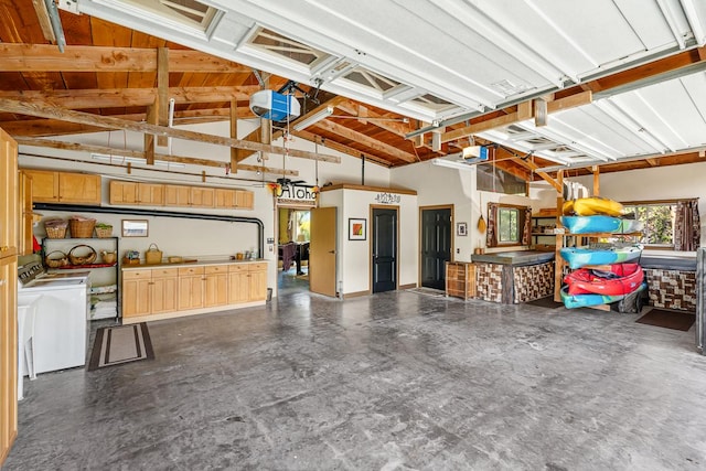 87-287 Kaohe Rd, Captain Cook, HI 96704 - garage with a garage door opener and separate washer and dryer