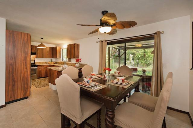 15-2037 24th Ave, Keaau, HI 96749 - dining area featuring plenty of natural light, ceiling fan, and light tile patterned flooring