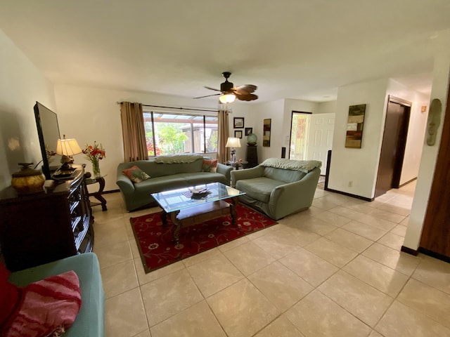 15-2037 24th Ave, Keaau, HI 96749 - living room featuring light tile patterned floors, ceiling fan, and baseboards
