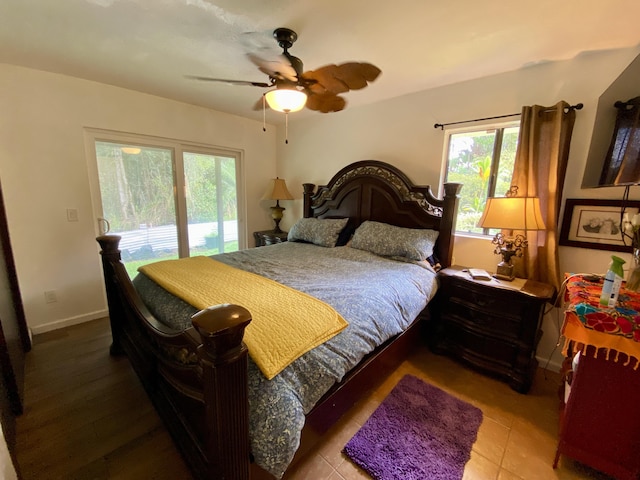 15-2037 24th Ave, Keaau, HI 96749 - bedroom featuring multiple windows, ceiling fan, baseboards, and access to exterior