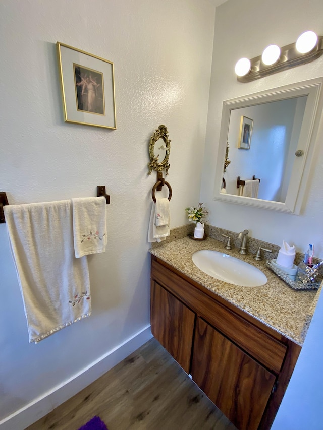 15-2037 24th Ave, Keaau, HI 96749 - bathroom featuring vanity and wood finished floors