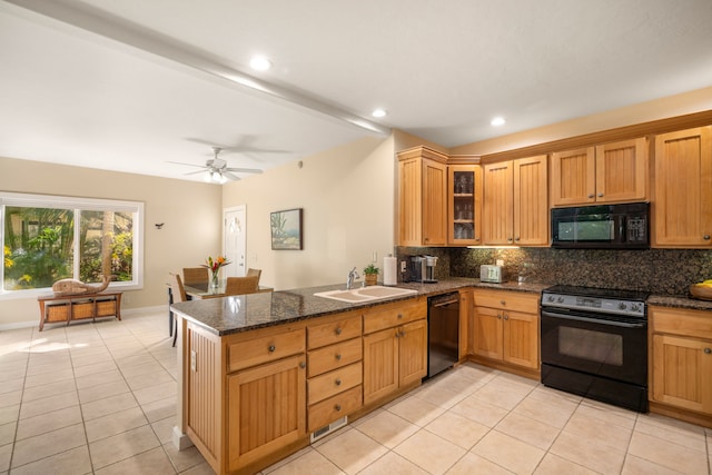 1831 Poipu Rd Unit 611, Koloa, HI 96756 - kitchen with black appliances, a sink, light tile patterned floors, backsplash, and recessed lighting