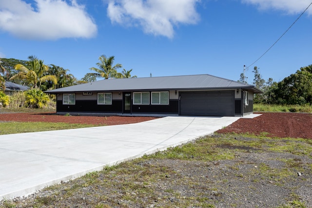 15-1779 14th Ave, Keaau, HI 96749 - ranch-style house featuring an attached garage and concrete driveway