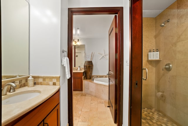 4-820 Kuhio Hwy Unit C205, Kapaa, HI 96746 - full bathroom featuring a stall shower, a garden tub, and vanity
