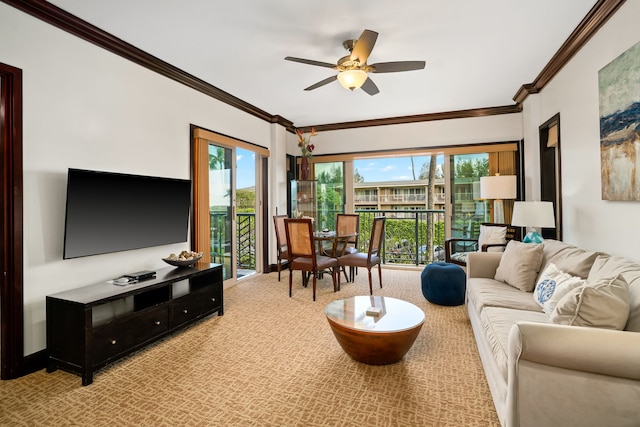 4-820 Kuhio Hwy Unit C205, Kapaa, HI 96746 - living room with light colored carpet, crown molding, ceiling fan, and plenty of natural light
