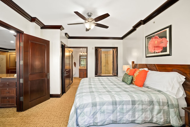 4-820 Kuhio Hwy Unit C205, Kapaa, HI 96746 - bedroom with ornamental molding, light carpet, ensuite bathroom, baseboards, and ceiling fan