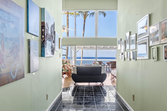 15-1023 Ala Heiau Rd, Keaau, HI 96749 - hall with baseboards, a water view, and a towering ceiling