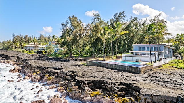 15-1023 Ala Heiau Rd, Keaau, HI 96749 - view of yard featuring a hot tub and a swimming pool