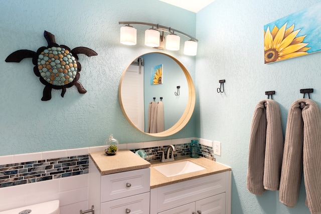 68-3890 Lua Kula St Unit 1007, Waikoloa, HI 96738 - bathroom featuring vanity, tile walls, and backsplash