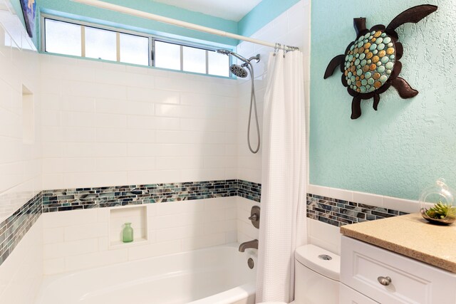 68-3890 Lua Kula St Unit 1007, Waikoloa, HI 96738 - full bath featuring tile walls, shower / tub combo with curtain, toilet, vanity, and a textured wall