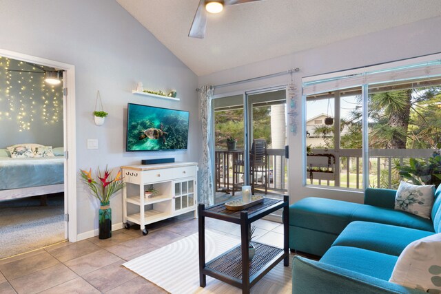 68-3890 Lua Kula St Unit 1007, Waikoloa, HI 96738 - living area with plenty of natural light, a ceiling fan, tile patterned floors, and high vaulted ceiling