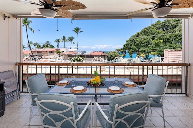 75-5719 Kona Plz Unit 203, Kailua-Kona, HI 96740 - view of patio with ceiling fan, outdoor dining area, and a balcony