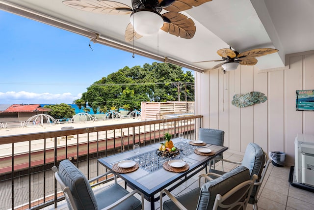 75-5719 Kona Plz Unit 203, Kailua-Kona, HI 96740 - balcony with a ceiling fan and outdoor dining area
