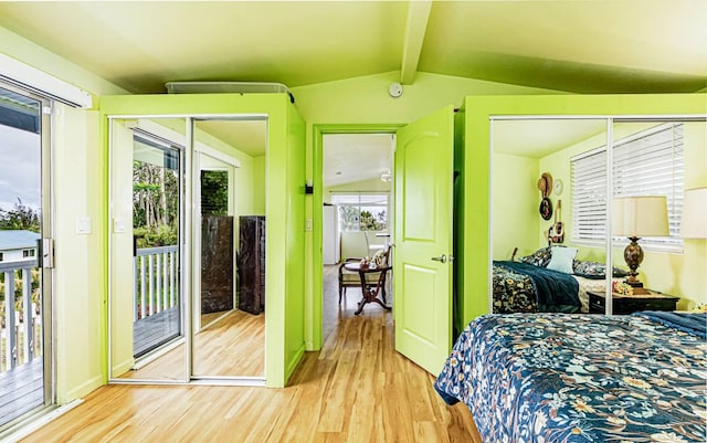 15-1688 18th Ave, Maia Keaau, HI 96749 - bedroom with access to exterior and wood finished floors