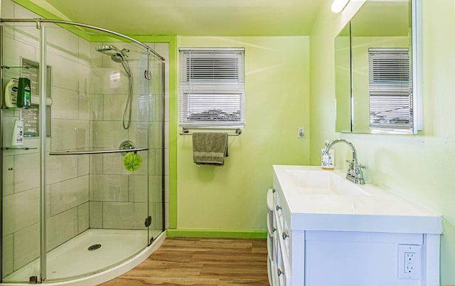 15-1688 18th Ave, Maia Keaau, HI 96749 - full bath with vanity, a shower stall, wood finished floors, and baseboards