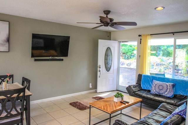 16-380 Melekule St, Kurtistown, HI 96760 - living room with ceiling fan, light tile patterned floors, and baseboards