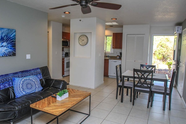 16-380 Melekule St, Kurtistown, HI 96760 - living room with ceiling fan, light tile patterned floors, baseboards, and recessed lighting